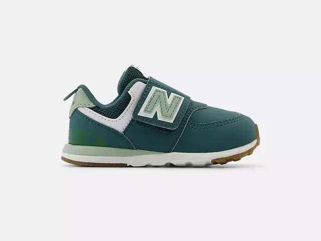 green and white toddler new balance trainers
