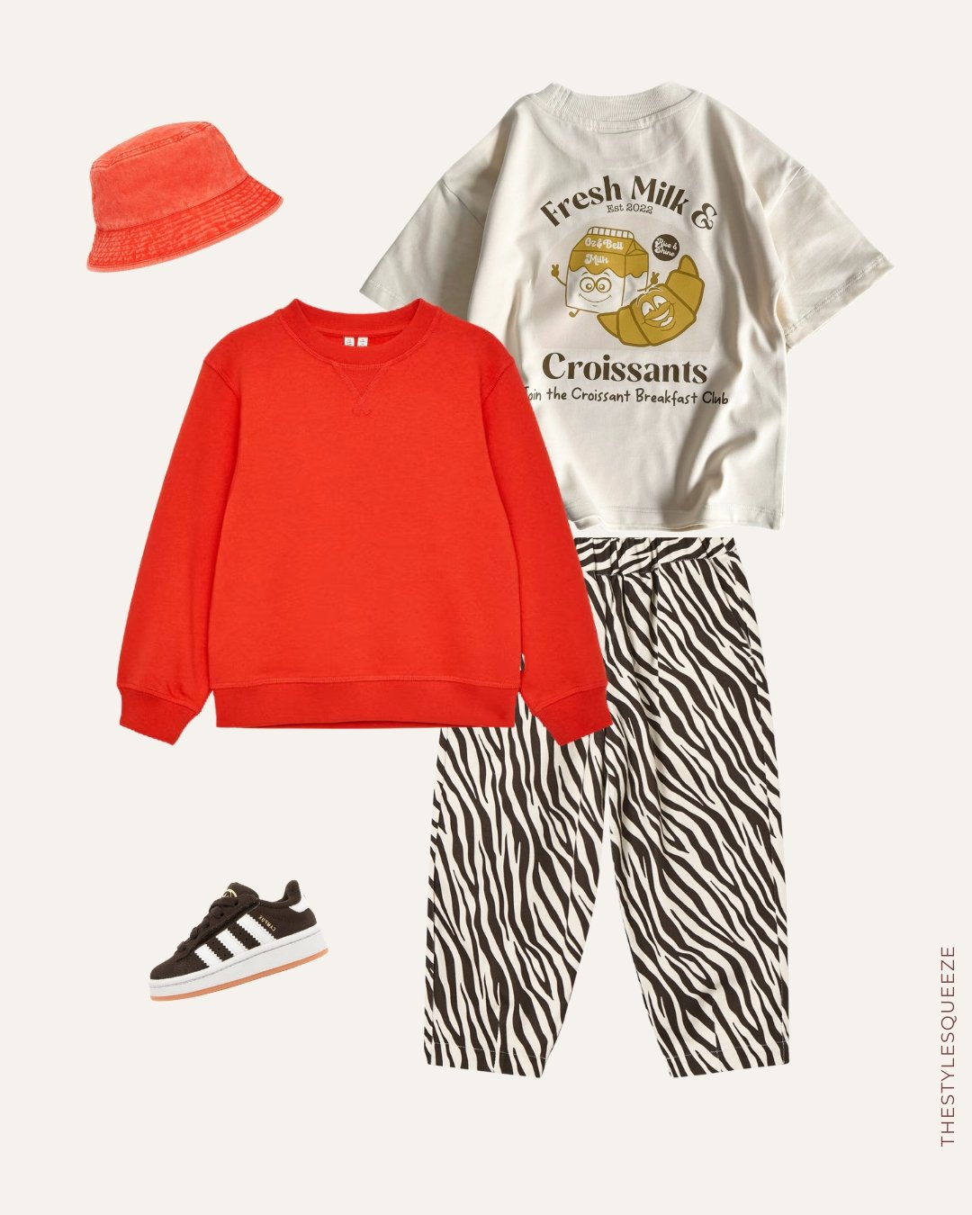 toddler festival outfit, orange sweatshirt and bucket hat, printed graphic tee, zebra print trousers